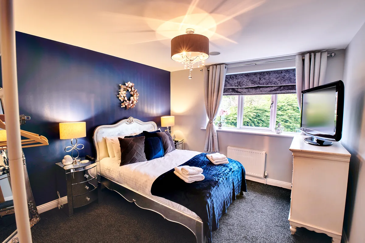 The Chase exterior — stone cottage with parking